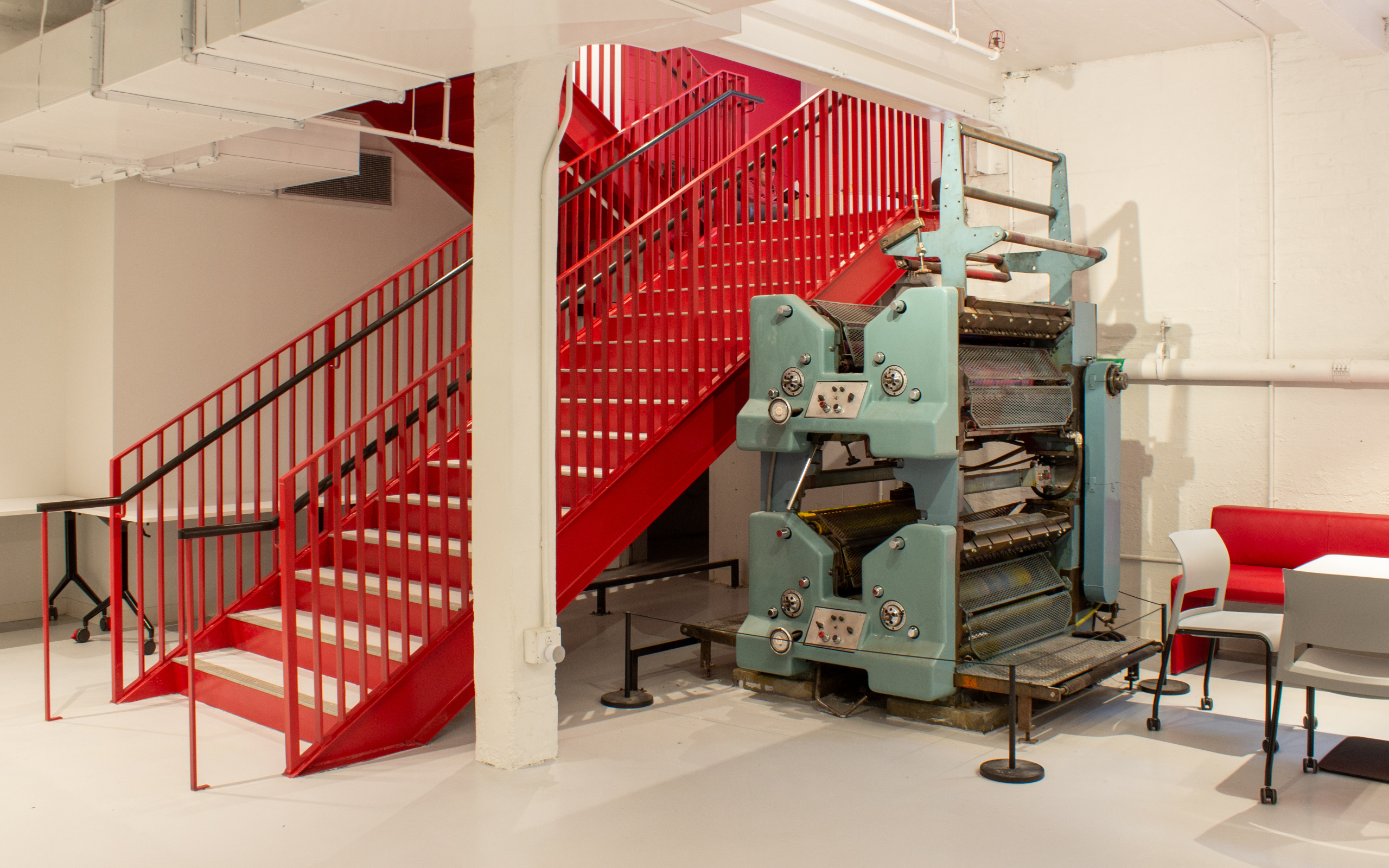 The basement entry stair at The Harvard Crimson