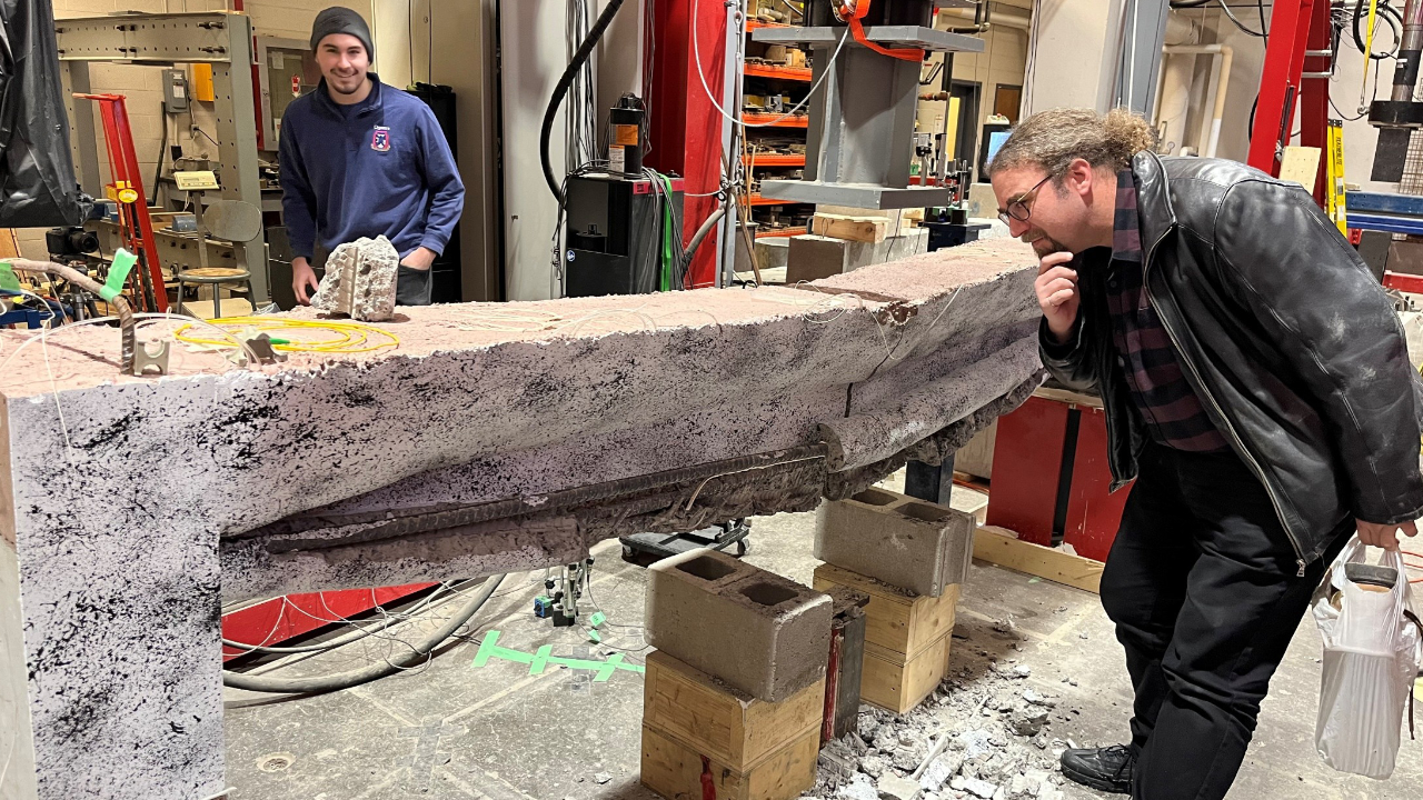 Image of shape-optimized beams being tested at Queen's University